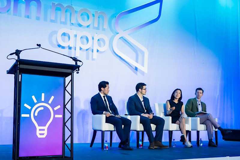 A group of seated people on stage